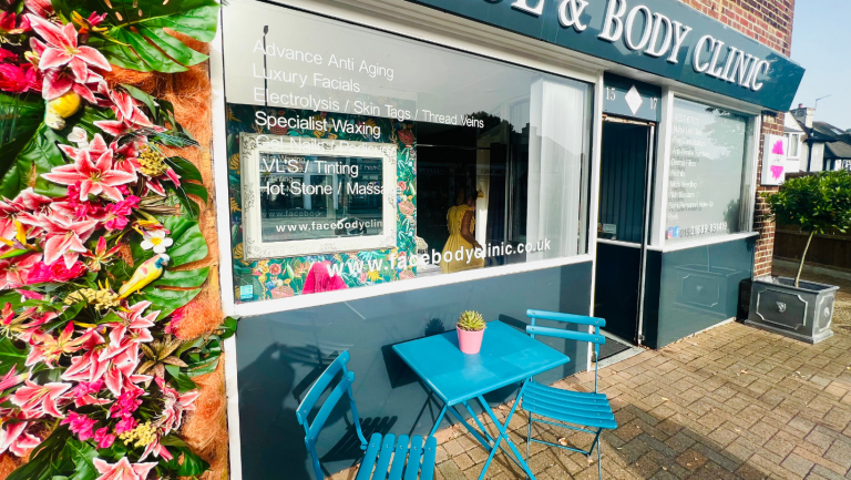 Chiropractic Clinic where a top Orpington chiropractor works, with beautiful flowers and chairs out side welcoming new patients in